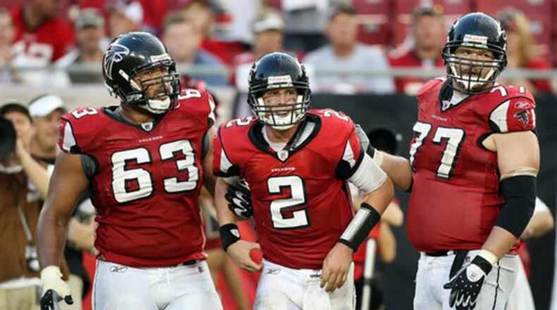 080914 TAMPA: Falcons guards #63 Justin Blalock, left, and #77 Tyson Clabo, right, help quarterback #2 Matt Ryan to his feet after he took a hard tackle by Buccaneers defensive end #90 Gaines Adams during late 4th quarter action at Raymond James Stadium in Tampa on Sunday, Sept. 14, 2008. Curtis Compton / ccompton@ajc.com FILE PHOTO: 080914 TAMPA: Falcons guards #63 Justin Blalock, left, and #77 Tyson Clabo, right, help quarterback #2 Matt Ryan to his feet after he took a hard tackle by Buccaneers defensive end #90 Gaines Adams during late 4th quarter action at Raymond James Stadium in Tampa on Sunday, Sept. 14, 2008. Curtis Compton / ccompton@ajc.co