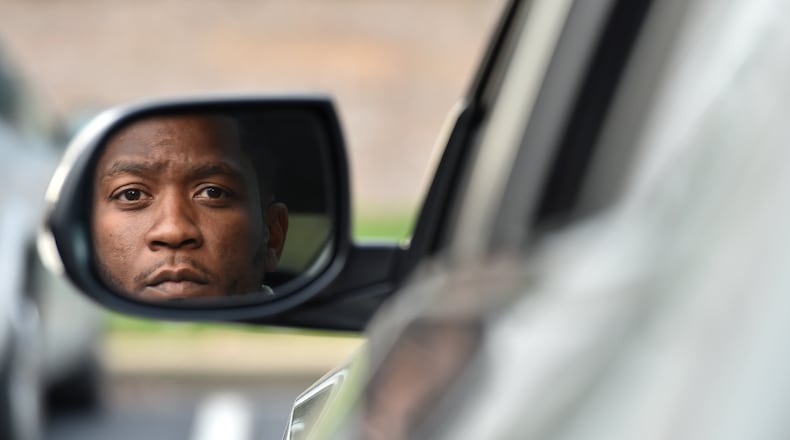 Brian Baker, a 33-year-old middle school teacher, has filled a complaint against Cobb County police officer Maurice Lawson for Lawson's unprofessional behavior during a traffic stop. Lawson was transferred, but Baker said the officer needs to be off the street.