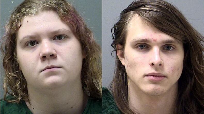 Victoria McCurley (left) and Alfred Dupree face a total of 15 charges between them,including conspiracy to commit murder, in connection with a threat last year to a Etowah High School in Cherokee County. (Cherokee County Sheriff’s Office)