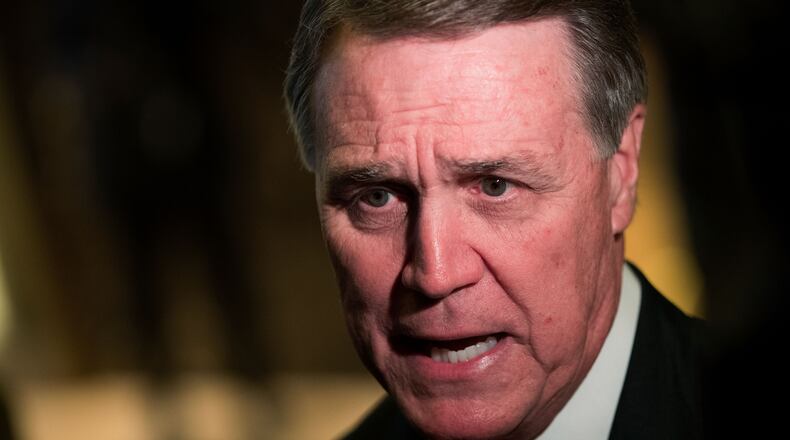 Sen. David Perdue (R-GA) speaks to reporters at Trump Tower on Dec. 2, 2016 in New York City. (Photo by Drew Angerer/Getty Images)