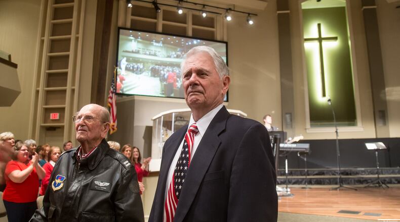 Clarence Boynton (R) and Harry Mann, two of the 11 living World War II veterans and members of the First Baptist Church of Peachtree City, stand during a Sunday service in Peachtree City, GA November 6, 2016. STEVE SCHAEFER / SPECIAL TO THE AJC