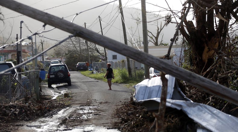 FILE -- In the aftermath of Hurricane Maria in Puerto Rico, Atlanta business owner Tiffany Brown promised the Federal Emergency Management Agency she could supply 30 million self-heating meals to survivors and won a $156 million contract to do so. On Tuesday, Brown was sentenced to 12 years in prison on 32 associated charges of fraud, theft and money laundering.  (AP Photo/Gerald Herbert)