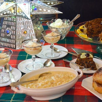 Christmas desserts found on Atlanta's tables may include (clockwise from top) Caribbean black cake, rabanadas from Brazil and arroz con leche from Latin America. (Virginia Willis for The Atlanta Journal-Constitution)