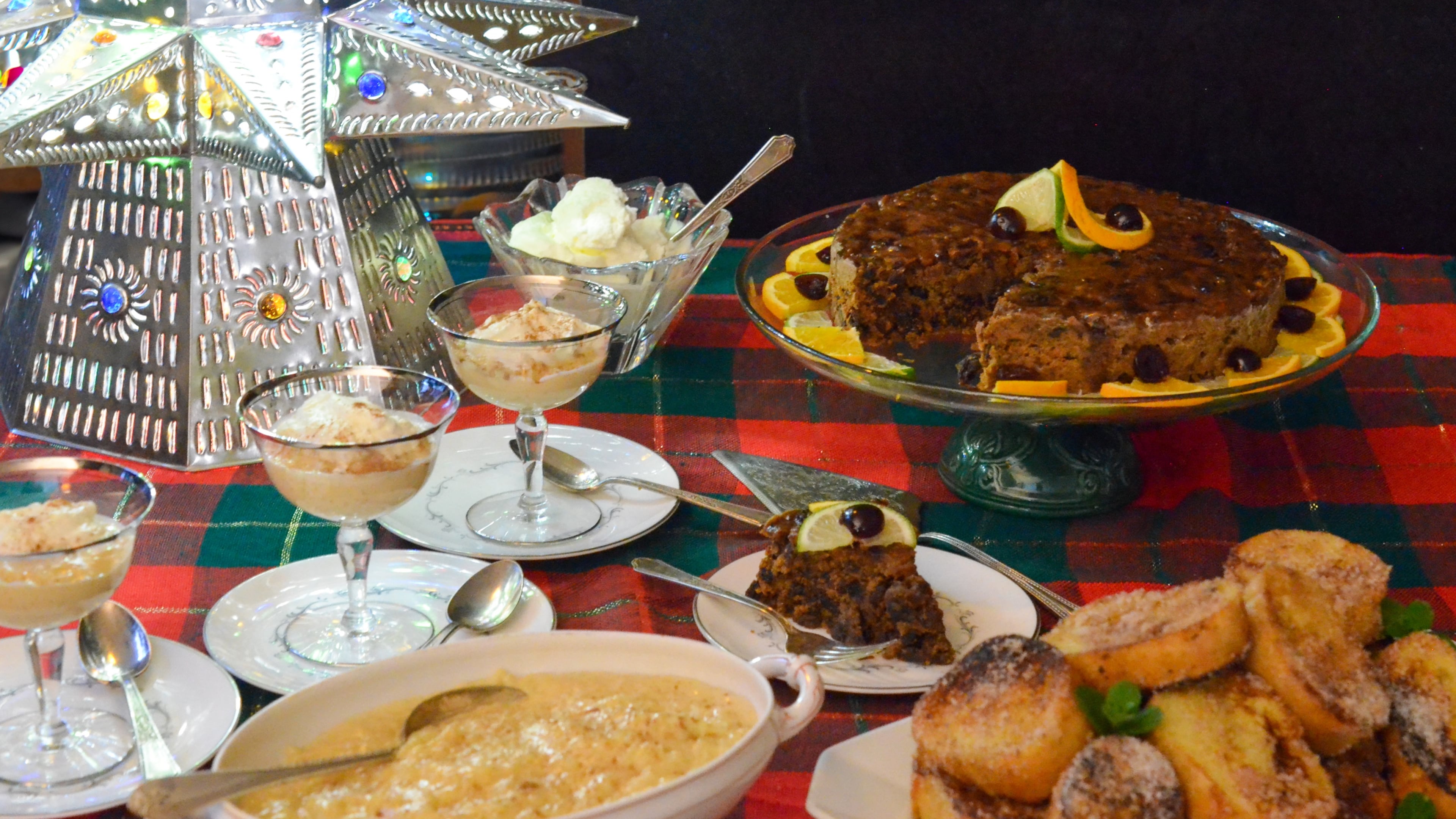 Christmas desserts found on Atlanta's tables may include (clockwise from top) Caribbean black cake, rabanadas from Brazil and arroz con leche from Latin America. (Virginia Willis for The Atlanta Journal-Constitution)