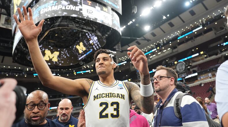 Michigan's Yaxel Lendeborg (23) celebrates after defeating Tennessee in the Elite Eight of the NCAA college basketball tournament, Sunday, March 29, 2026, in Chicago. (AP Photo/Erin Hooley)