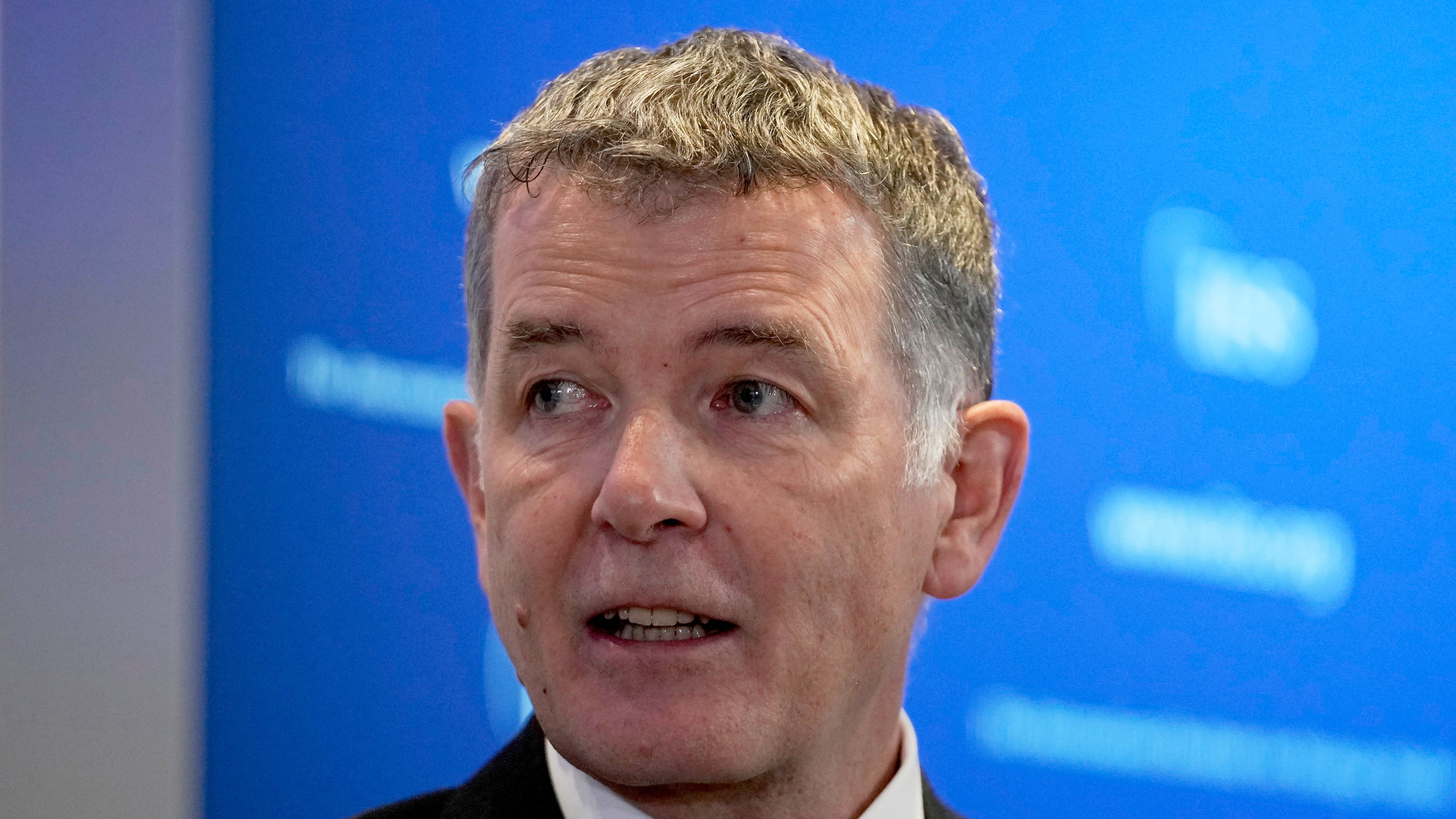 FILE - Richard Moore, the Chief of Britain's Secret Intelligence Service, also known as MI6, answers questions in London, England, Nov. 30, 2021, after giving his first public speech since becoming head of the organization. (AP Photo/Matt Dunham, File)