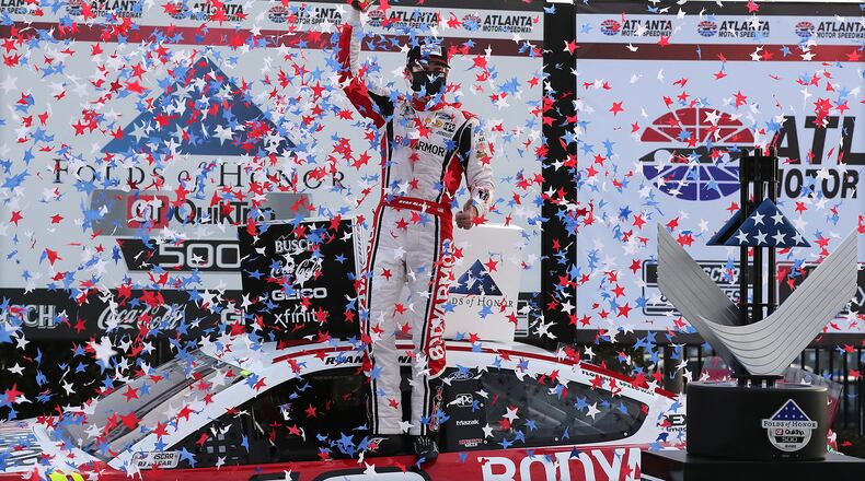 Ryan Blaney is showered with stars as he celebrates winning the Atlanta Motor Speedway Folds of Honor QuickTrip 500 in victory lane on Sunday, March 21, 2021, in Hampton. Curtis Compton / Curtis.Compton@ajc.com