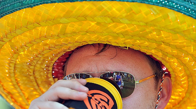 June 23, 2012 Atlanta - David Preston, of Atlanta, takes a sip of beer during the 2012 Atlanta Summer Beer Fest at Masquerade Music Park on Saturday, June 23, 2012. This year, the fest features over 150 beers, live music with Stokeswood and the Revivalists, great food options, and additional fun and games at the Masquerade Music Park. HYOSUB SHIN / HSHIN@AJC.COM
