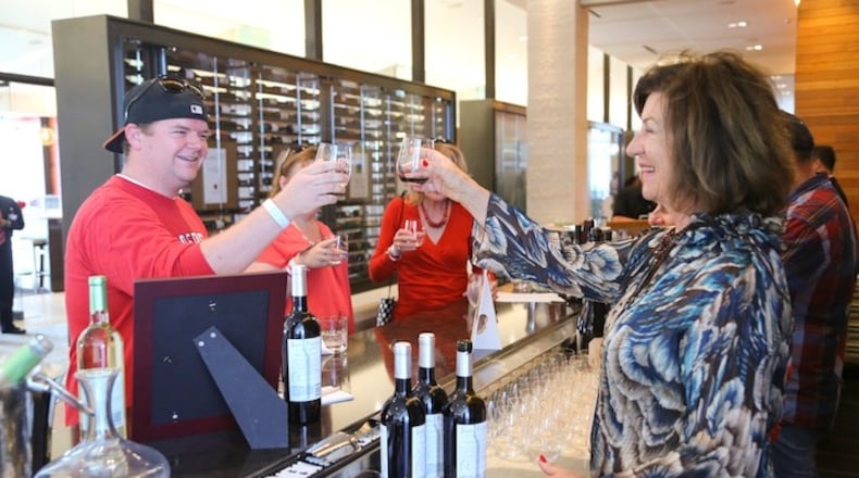 In an undated handout photo, football fans interact with vendors of the Appellation 49 vintners in the Citrix Owners Club at Levi's Stadium, home of the San Francisco 49ers. Wine sales have been steadily growing faster than beer sales, especially around Super Bowl time. (49ers.com via The New York Times) -- NO SALES; FOR EDITORIAL USE ONLY WITH FBN SUPER WINE BY KEN BELSON FOR FEB. 1, 2016. ALL OTHER USE PROHIBITED. --