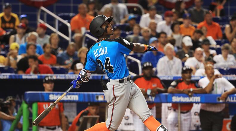 MIAMI, FL - JULY 09: Ronald Acuna #24 of the Atlanta Braves and the World Team swings at a pitch against the U.S. Team during the SiriusXM All-Star Futures Game at Marlins Park on July 9, 2017 in Miami, Florida. (Photo by Mike Ehrmann/Getty Images)