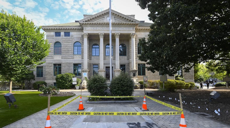 The spot where an obelisk confederate monument once stodd on the courthouse grounds, is shown before a press conference occurs in reference to it in Decatur. DeKalb Superior Court Judge Clarence Seeliger declared the monument that was erected in 1908 by the United Daughters of the Confederacy, to be a public nuisance that should be removed. JOHN AMIS FOR THE ATLANTA JOURNAL-CONSTITUTION AJC FILE PHOTO
