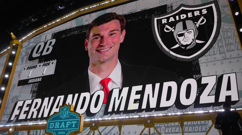 Indiana quarterback Fernando Mendoza is shown on a screen after being chosen by the Las Vegas Raiders with the first overall pick during the first round of the NFL football draft, Thursday, April 23, 2026, in Pittsburgh. (AP Photo/Gene J. Puskar)