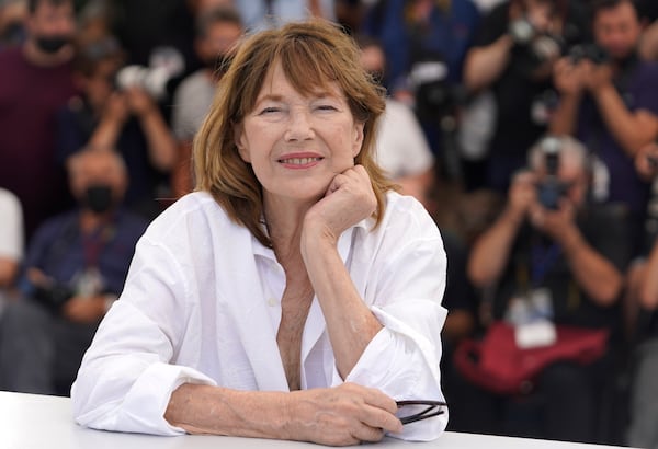 FILE - Jane Birkin poses for photographers at the photo call for the film 'Jane By Charlotte' at the 74th international film festival, Cannes, southern France, Thursday, July 8, 2021. (AP Photo/Brynn Anderson, File)