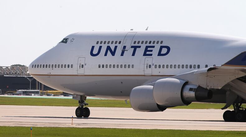 CHICAGO, IL - SEPTEMBER 19: A United Airlines jet taxis at O'Hare International Airport on September 19, 2014 in Chicago, Illinois. In 2013, 67 million passengers passed through O'Hare, another 20 million passed through Chicago's Midway Airport, and the two airports combined moved more than 1.4 million tons of air cargo. (Photo by Scott Olson/Getty Images)