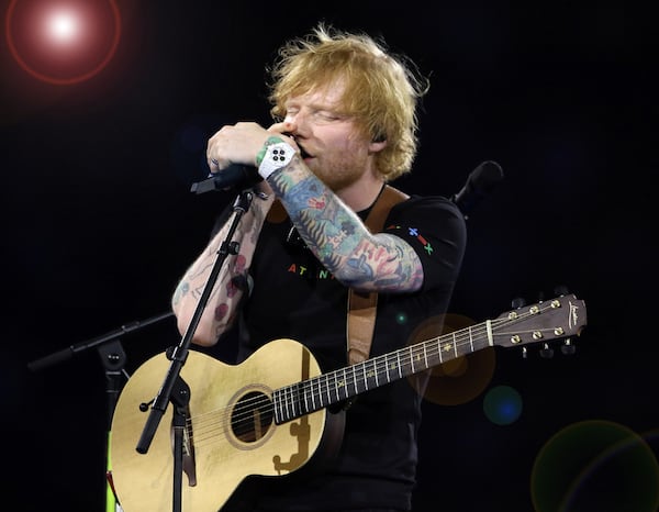Ed Sheeran — pictured performing at Mercedes-Benz Stadium in May 2023 —  will return to the venue for his 2026 "Loop Tour." (Robb Cohen for the AJC 2023)