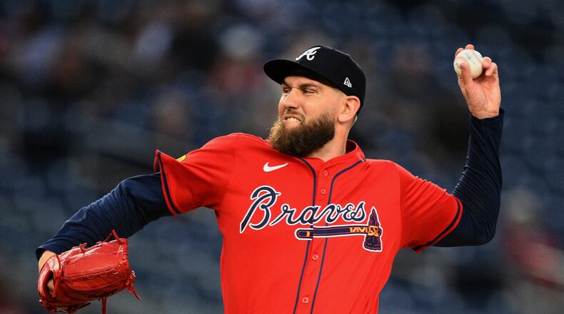 FILE - Atlanta Braves relief pitcher Dylan Lee throws during the seventh inning of a baseball game against the Washington Nationals, Sept. 17, 2025, in Washington. (AP Photo/Nick Wass, File)