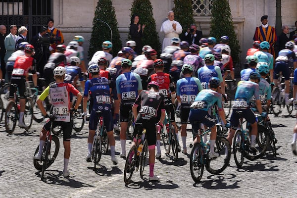Pope Leo XIV blesses the pack before the official start of the final stage of the Giro d'Italia cycling race inside the Vatican City, Sunday, June 1, 2025. (AP Photo/Andrew Medichini)