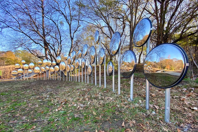 Thirty-six security mirrors are incorporated into Atlanta artist Gregor Turk's latest public art installation, "Myriad." The installation, in Piedmont Park, was unveiled Dec. 21.