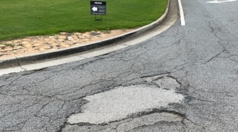 A reader wants this street fixed in Roswell.