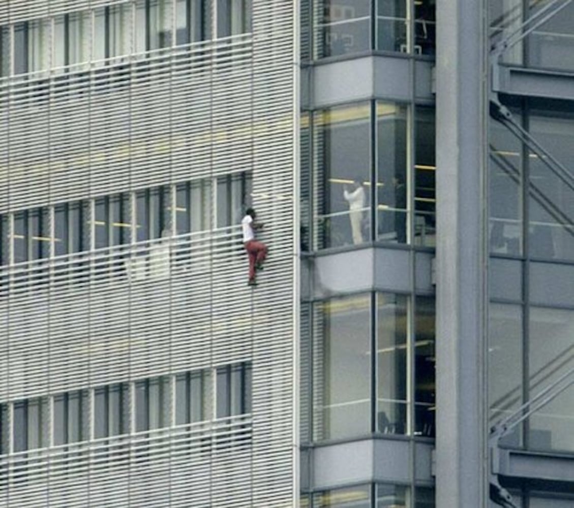 Two daredevils scale New York Times building