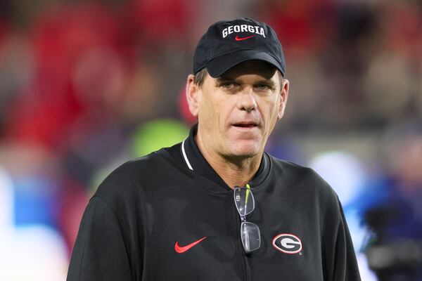 Georgia offensive coordinator Mike Bobo watches warm-ups before Georgia’s game against Georgia Tech at Bobby Dodd Stadium, Saturday, November 25, 2023, in Atlanta. (Jason Getz / Jason.Getz@ajc.com)