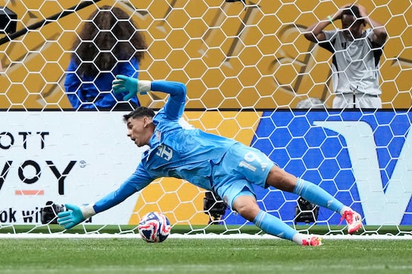Inter Miami's Oscar Ustari allows a goal by Paris Saint-Germain's Joao Neves during the Club World Cup round of 16 soccer match between PSG and Inter Miami in Atlanta, Sunday, June 29, 2025. (AP Photo/Brynn Anderson)