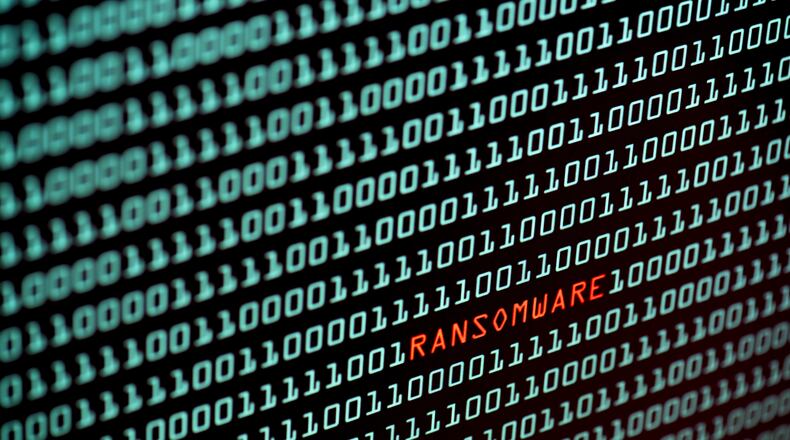 The Georgia Superior Court Clerks’ Cooperative Authority said Nov. 23 it suffered a "credible and ongoing cybersecurity threat," requiring defensive security protocols. (Thamrongpat Theerathammakorn/Dreamstime/TNS)