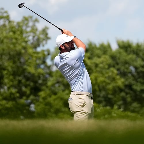 Scottie Scheffler hits from the 12th tee during the final round of the St. Jude Championship golf tournament, Sunday, Aug. 16, 2026, in Memphis, Tenn. (AP Photo/George Walker IV)
