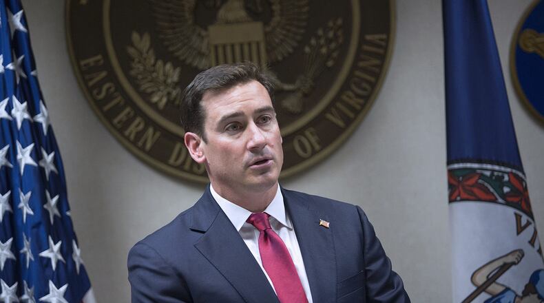 G. Zachary Terwilliger, U.S. Attorney, center, speaks during a press conference inside the United States Attorney's Office in Norfolk, Va., Thursday, Aug. 29, 2019.
