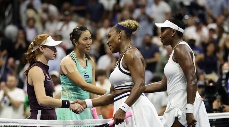 Venus, right, and Serena Williams, of the United States, congratulate Maya Joint, left, of Australia, and Hao-Ching Chan, of Taiwan, after their women's doubles match at the U.S. Open tennis championships, Friday, Sept. 4, 2026, in New York. (AP Photo/Adam Hunger)