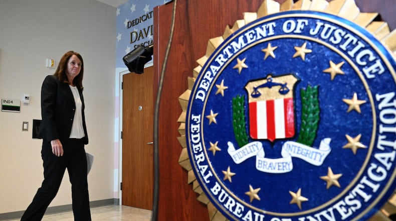 August 16, 2022 Chamblee - Keri Farley, Special Agent in Charge, walks to the podium for a press conference to release local numbers in a multi-state child trafficking operation at Atlanta FBI Field Office in Chamblee on Tuesday, August 16, 2022. (Hyosub Shin / Hyosub.Shin@ajc.com)