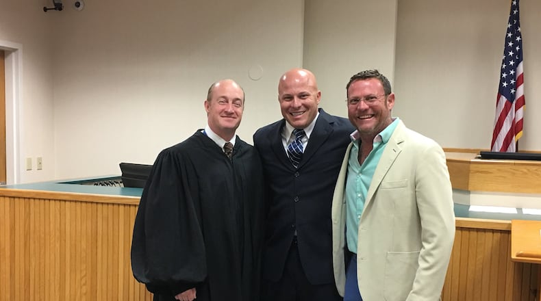 Peter Del Toro, center, with Martin County Judge Darren Steele (left) and Dr. Timothy Sigman, Del Toro’s former co-defendant, after the judge swears Del Toro into the Florida Bar on Monday, April 17, 2017.