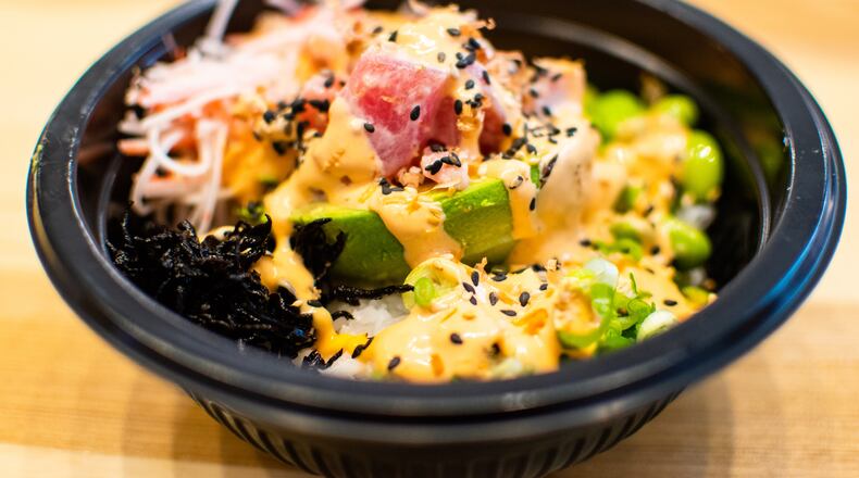 A poké bowl topped with the PokéSpot's signature avocado boat. CONTRIBUTED BY HENRI HOLLIS