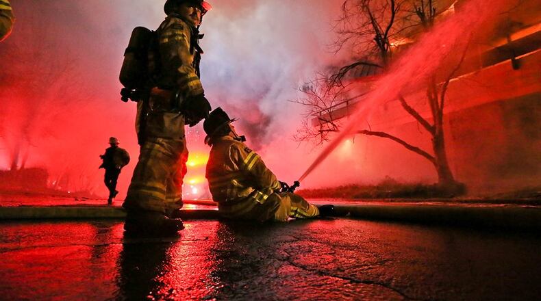 DeKalb County firefighters were battling a huge fire early Tuesday in an office building on Memorial Drive.