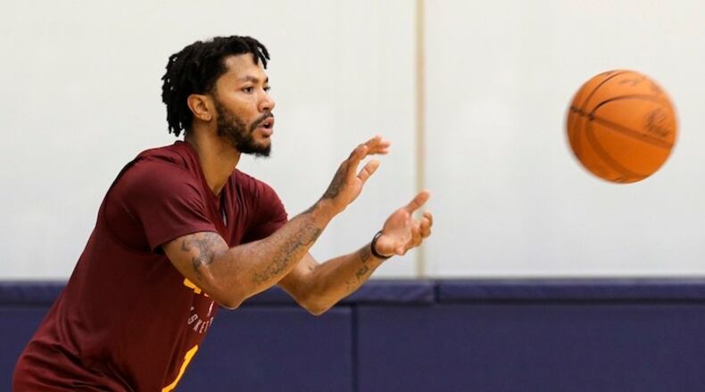 Cleveland Cavaliers' Derrick Rose catches a pass during practice at the team's training facility, Friday, Sept. 29, 2017, in Independence, Ohio. (AP Photo/Tony Dejak)