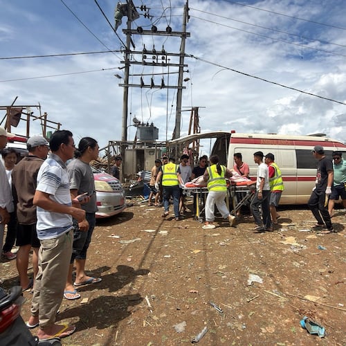This photo provided by Ta'ang women organization shows rescue work after an explosion in Kaungtup village, Namhkam township, Shan State, Myanmar, Sunday, May 31, 2026. (Ta'ang women organization via AP)