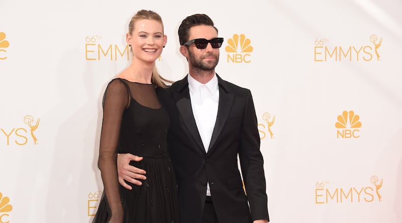 LOS ANGELES, CA - AUGUST 25: Singer Adam Levine (R) and model Behati Prinsloo attend the 66th Annual Primetime Emmy Awards held at Nokia Theatre L.A. Live on August 25, 2014 in Los Angeles, California. (Photo by Jason Merritt/Getty Images)