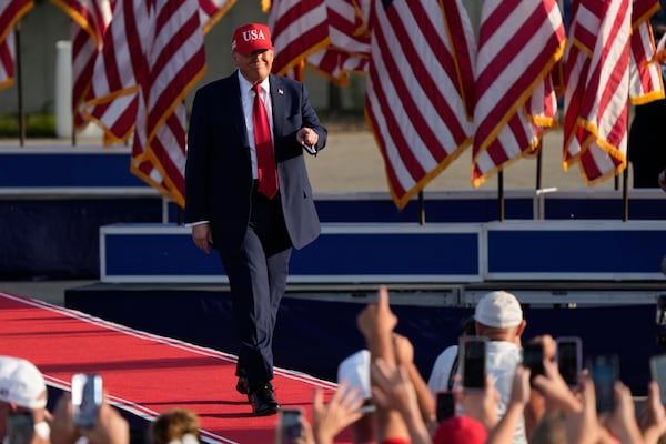President Donald Trump arrives to speak at a rally at the Iowa State Fairgrounds, Thursday, July 3, 2025, in Des Moines, Iowa. (AP Photo/Charlie Neibergall)