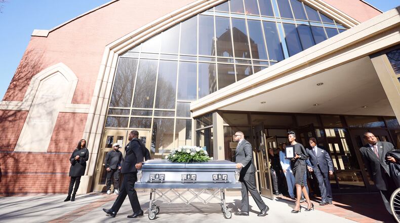 After the funeral service, pallbearers carry the remains of Cornelius Taylor out of Ebenezer Baptist Church. The remains were placed in a horse-drawn carriage for a procession toward Atlanta City Hall on Monday, February 3, 2025.
(Miguel Martinez/ AJC)
