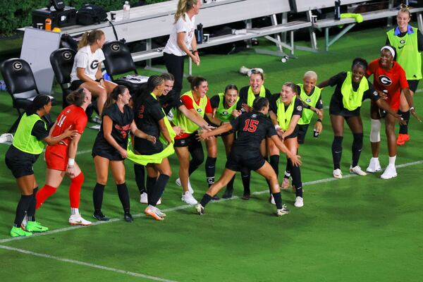 Georgia midfielder Leila Avila celebrates her goal with teammates during their “Soccer in Sanford” game against James Madison on Thursday, Aug. 20, 2026, in Athens. (Jason Getz/AJC)