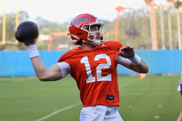 University of Florida QB Aaron Philo throwing a pass during fall camp practice. (Photo by Zach Goodall/247 Sports)