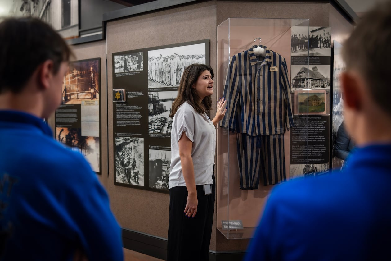 Docent Ariana Gil speaks to a school group from Monticello at the Breman, a Jewish heritage museum in Atlanta. People of goodwill must listen as growing numbers of Jews express a lived experience of fear and ostracization. (Audra Melton/The New York Times 2024)