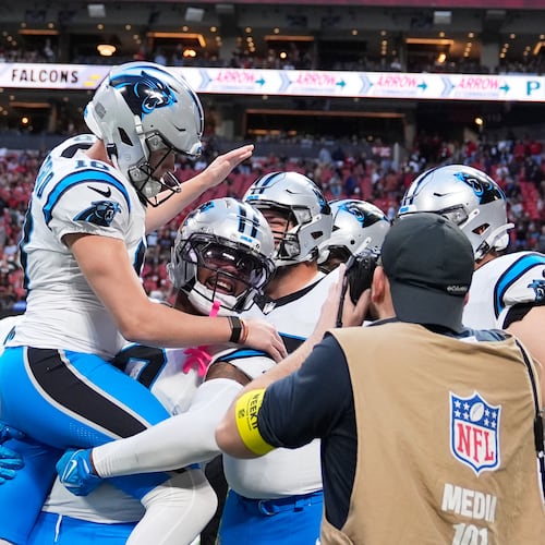 Carolina Panthers place kicker Ryan Fitzgerald (10) celebrates his game wining field goal during overtime of an NFL football game against the Atlanta Falcons, Sunday, Nov. 16, 2025, in Atlanta. (AP Photo/Brynn Anderson)