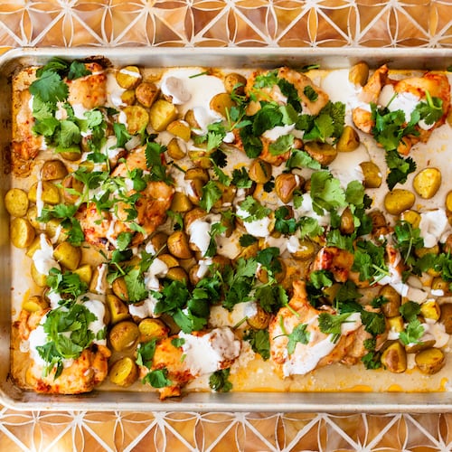 Sheet pan harrissa chicken and potatoes is a classic weeknight meal. (AJC FILE)