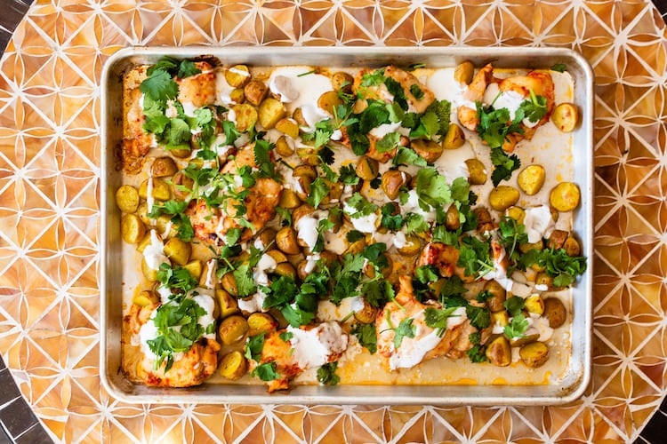 Sheet pan harrissa chicken and potatoes is a classic weeknight meal. (AJC FILE)