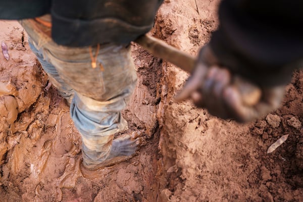 A worker mines for gold at a site in the Kedougou region of Senegal on Thursday, Jan. 16, 2025. (AP Photo/Annika Hammerschlag)