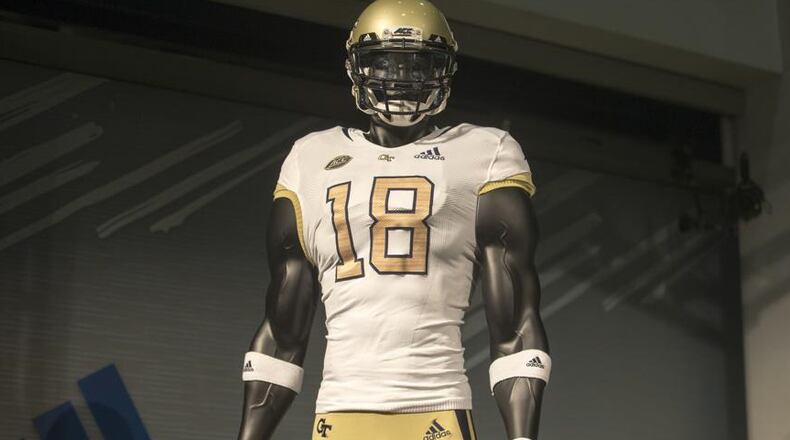 The new Georgia Tech football uniforms are displayed at Ventanas during a uniform reveal party in Atlanta, Friday, August 3, 2018. Tech collaborated with Adidas to create new uniforms for the 2018 season. (ALYSSA POINTER/ALYSSA.POINTER@AJC.COM)