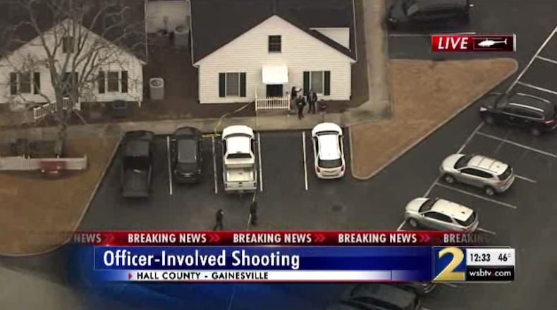 A man was shot and killed after holding people hostage inside a dermatology office Monday morning in Hall County, officials said.