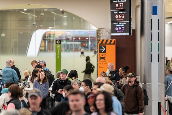 Security lines reached nearly two hours long again Tuesday morning, according to wait times posted by the Atlanta airport — though actual wait times can be even longer. (Ben Hendren for the AJC)