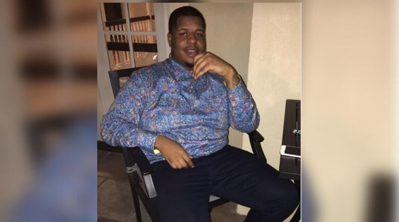 Reginald Simon was found dead from a gunshot wound at a northwest Atlanta apartment.